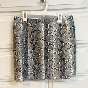 AKIRA black label “pleather” miniskirt, size M.